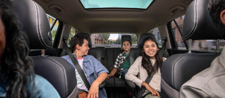 Kids sitting in back seats of 2023 Volkswagen Atlas