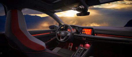 2023 Volkswagen Golf GTI interior with red ambient lighting