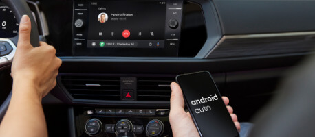 Person connecting phone to 2023 Volkswagen jetta infotainment center