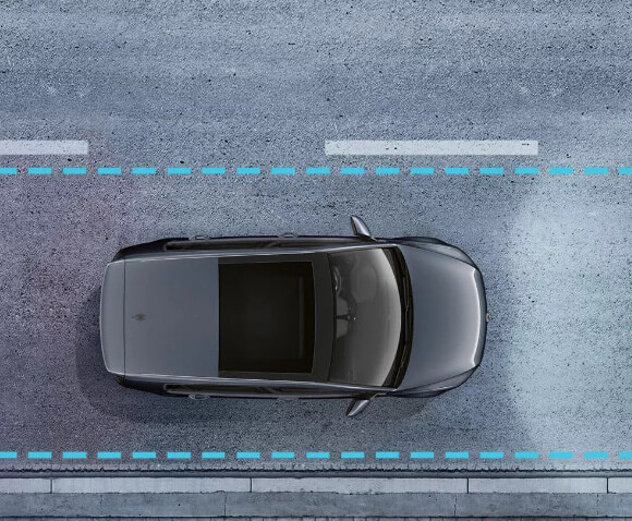 Volkswagen vehicle using lane assist technology while driving on road