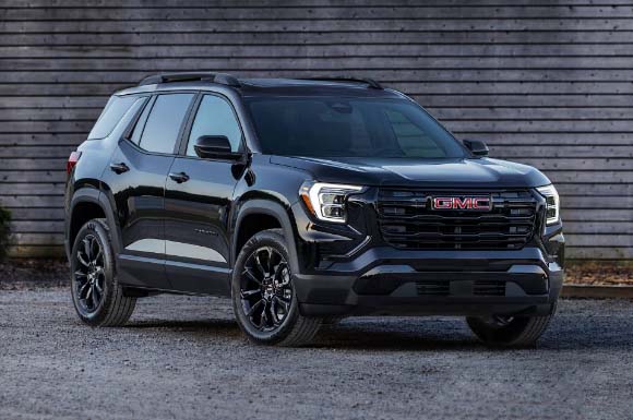 front_view_of_red_cadillac_lyriq_with_led_headlights_at_sunset