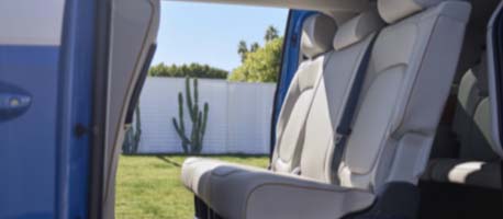 Close up white passenger seats vw buzz