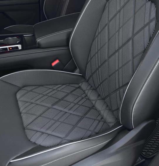 Close_up_black_leather_vw_seat