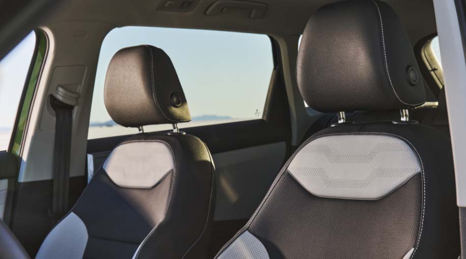 Interior view of black and grey two tone front seats of a 2026 Taos