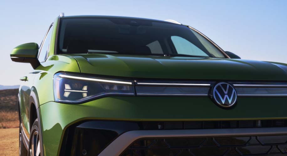 Front view of the 2026 Volkswagen Taos showcasing its dynamic cornering LED headlights.