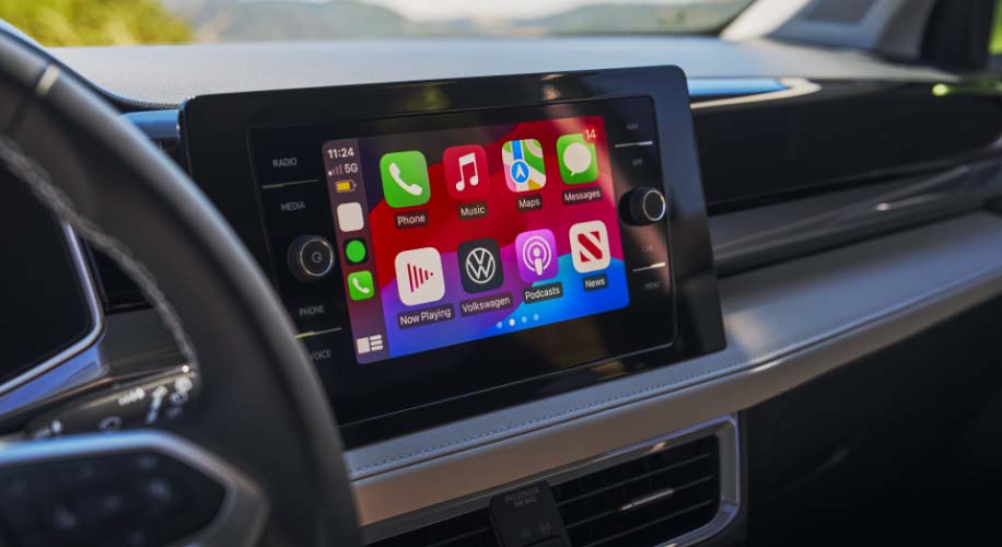 Touchscreen in the 2026 Volkswagen Taos displaying Apple CarPlay and Android Auto interface.