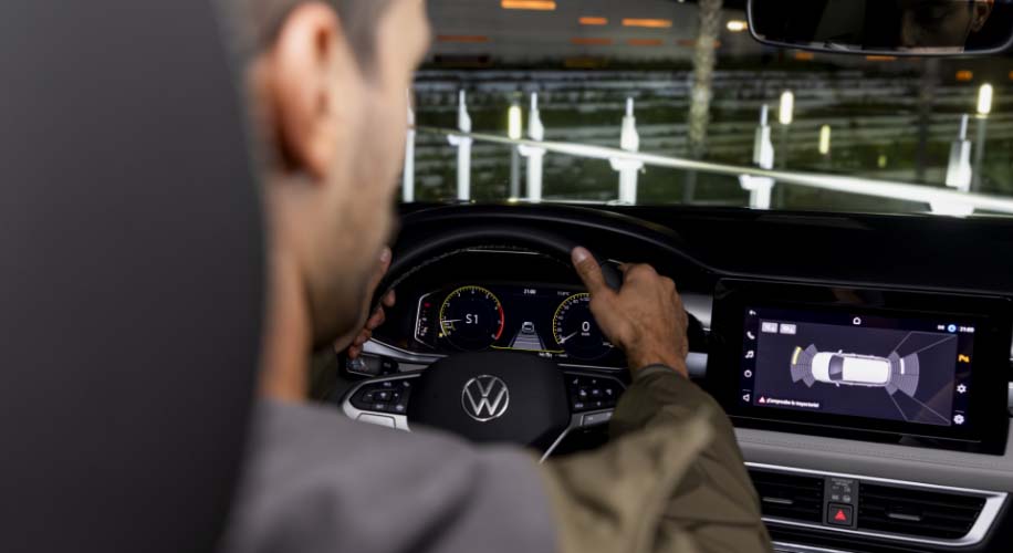 View of the 2026 Volkswagen Taos interior showing Park Distance Control on the dashboard screen.