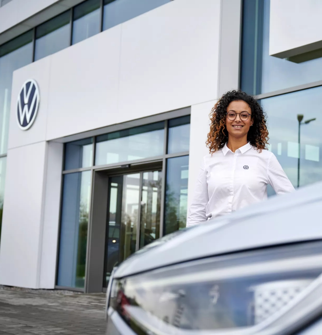 VW Expert standing outside of their dealership