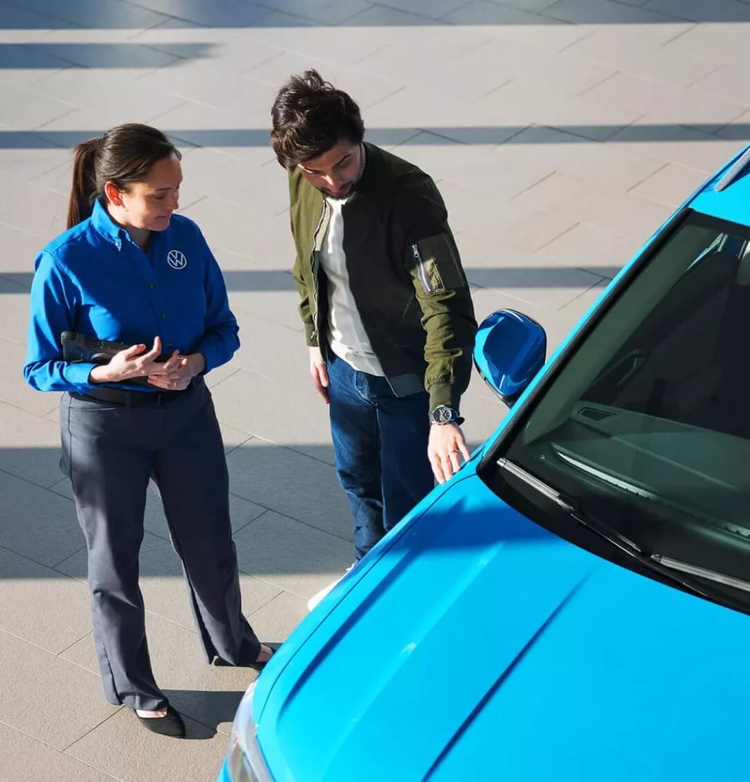 Person talking with a VW technician